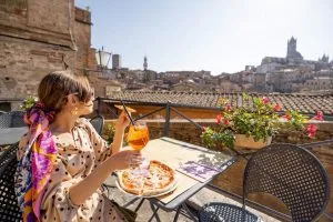 Indulge in a leisurely feast amidst the charm of Siena